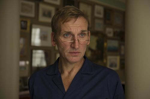 Christopher Eccleston as John Aspinall.