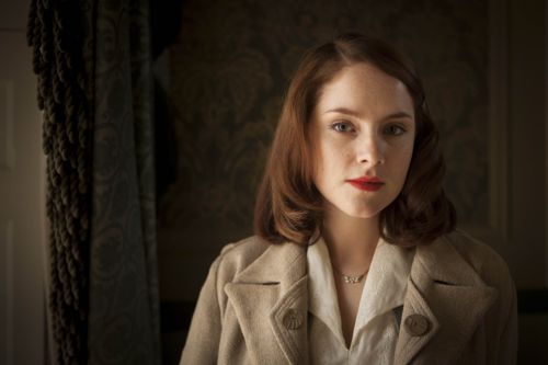 Sophie Rundle as Lucy.