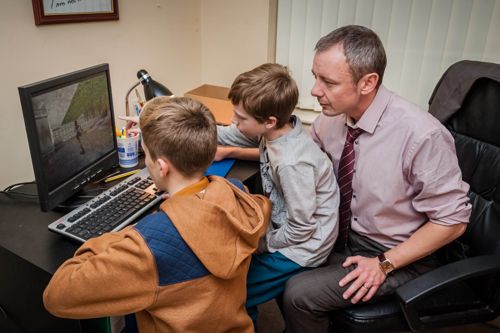 Marcus Farrow and his two young sons.
