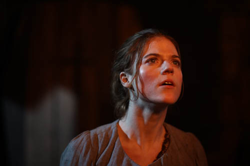 Rose Leslie as Sarah.